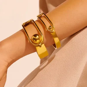 Luxurious gold statement bracelets representing ATD Advertising's premium digital marketing solutions and elegant brand positioning strategies. #digitalmarketing #brandstrategy #luxurymarketing #premiumadvertising